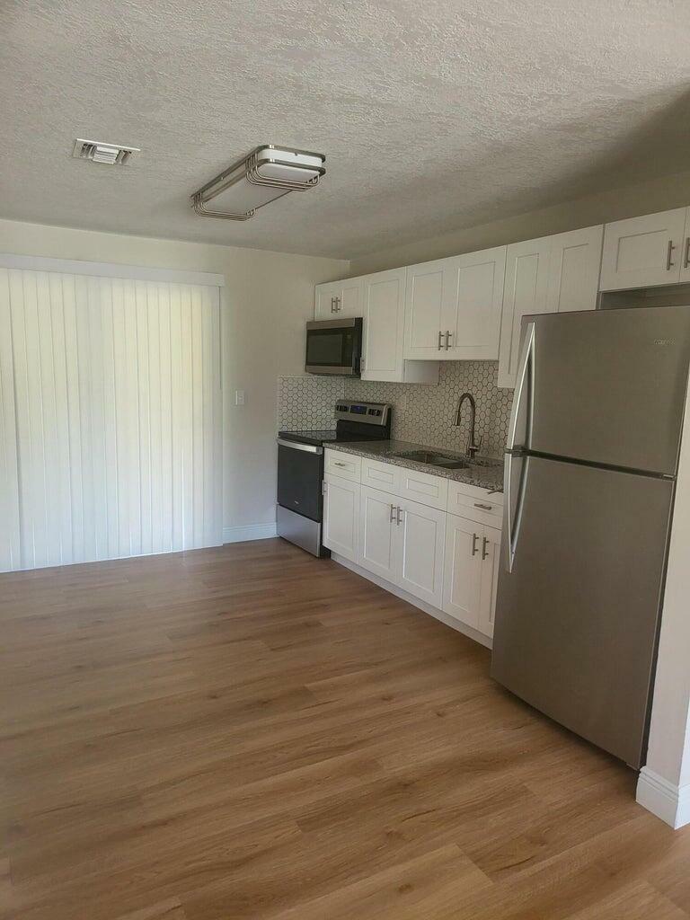 Property Photo: 2727 SE Normand Street #1 FL 34997