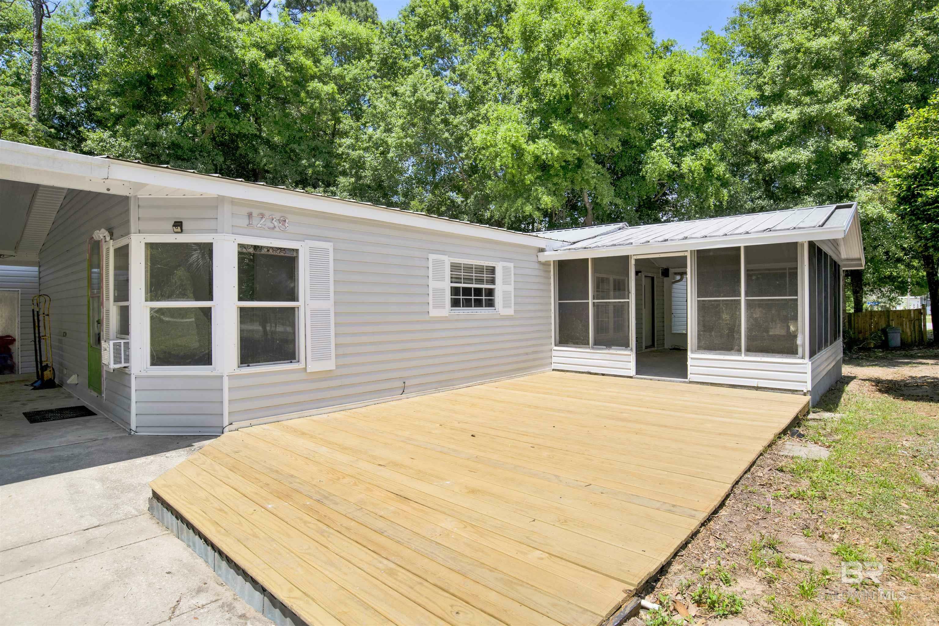 Property Photo: 1238 Pensacola Drive AL 36549