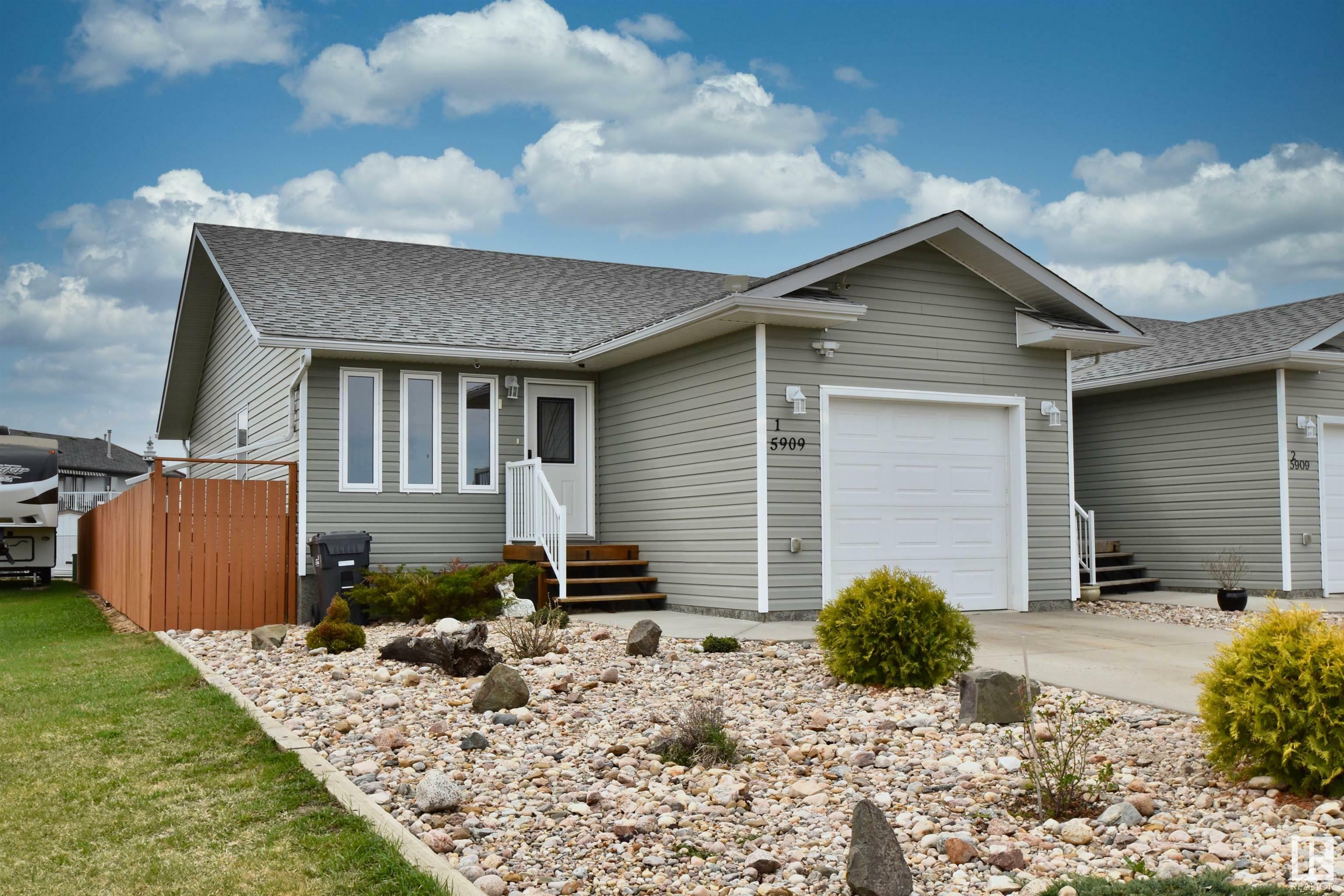 Property Photo: 5909 48 Avenue 1 AB T0A 3A1