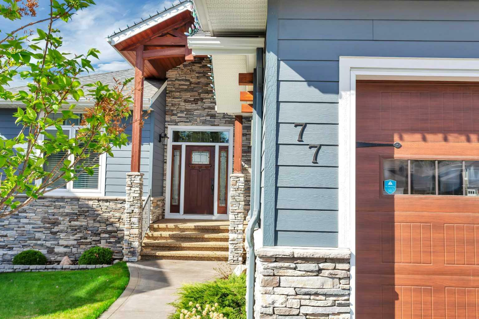 Property Photo: 77 Grove Close AB T4P 0P4