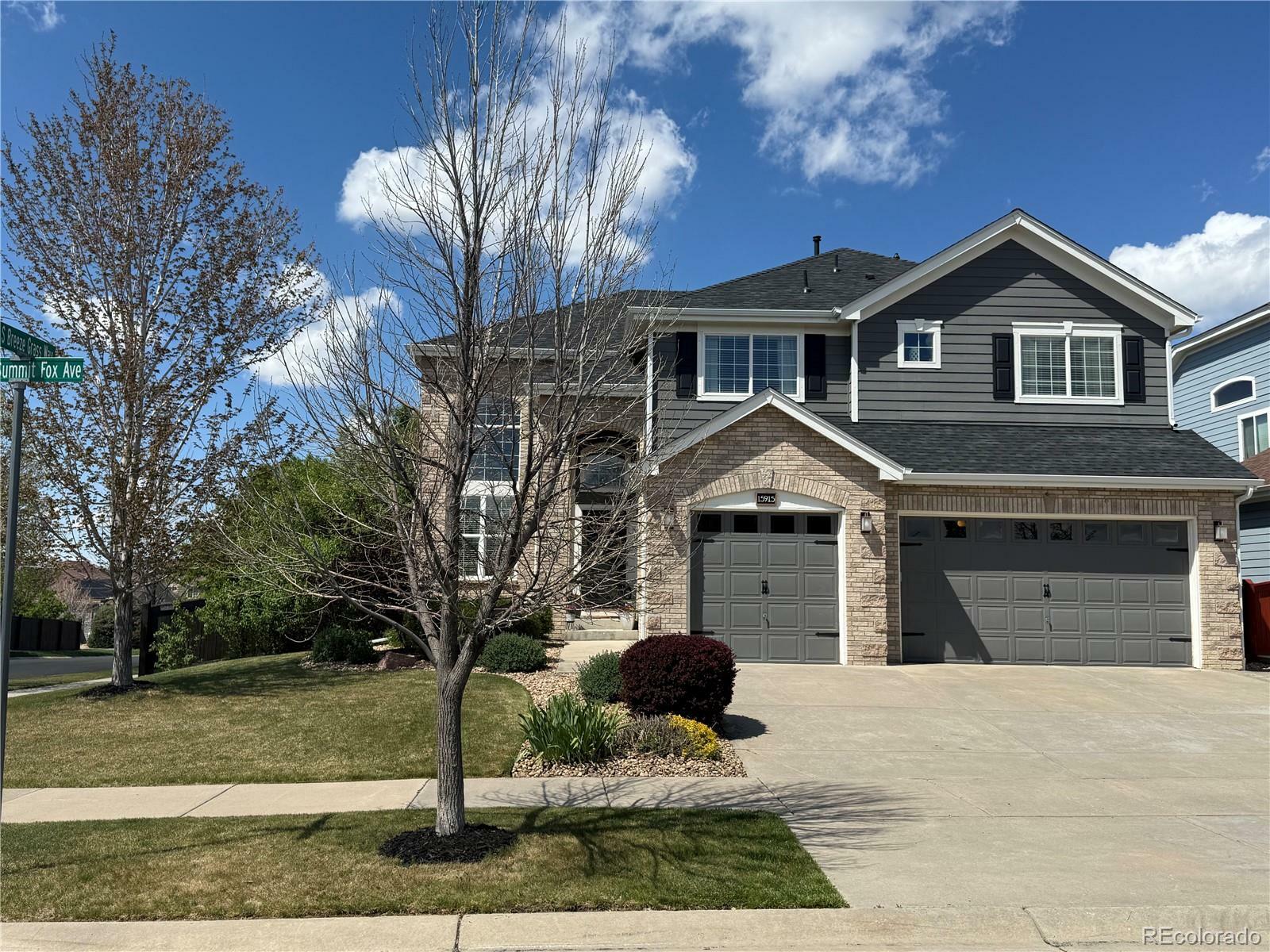 Property Photo: 15915 E Summit Fox Avenue CO 80134