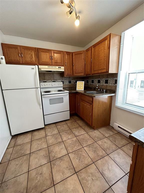 Property Photo: 629 Corydon Avenue MB R3M 0W3