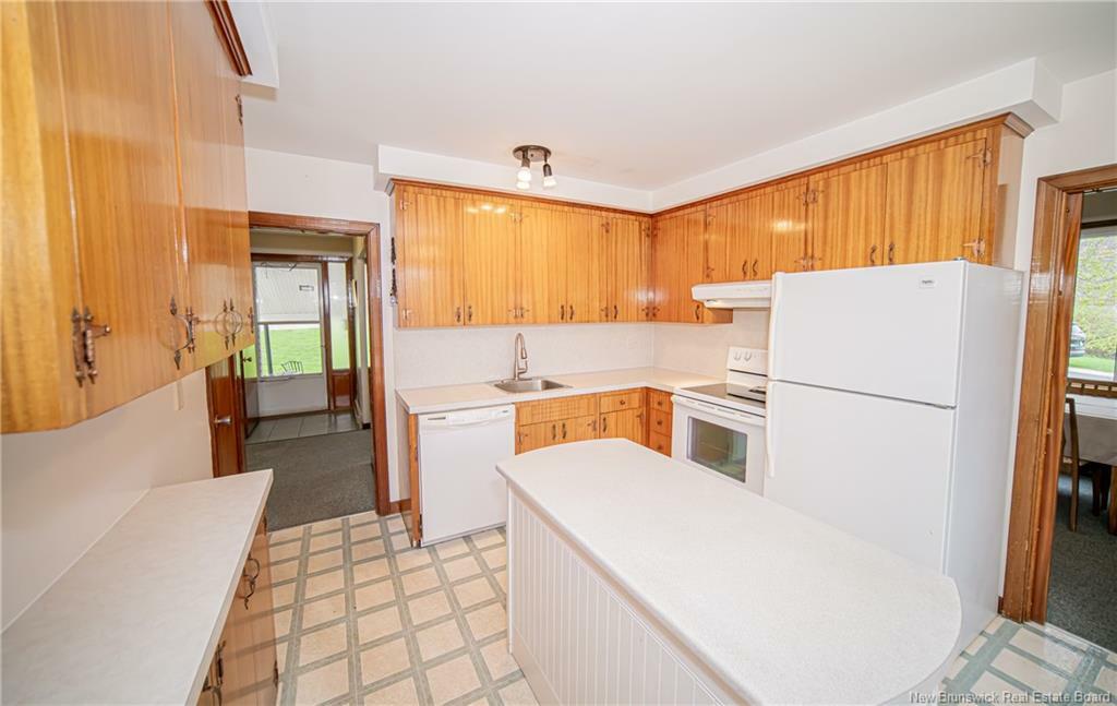 Property Photo: 402 Covert Street NB E2V 1E7
