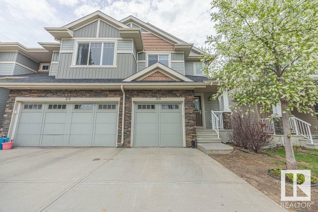 Property Photo: 2004 Trumpeter Way NW 30 AB T5S 0J9