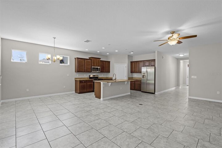 Property Photo:  405 E Freesia Court  FL 32724 