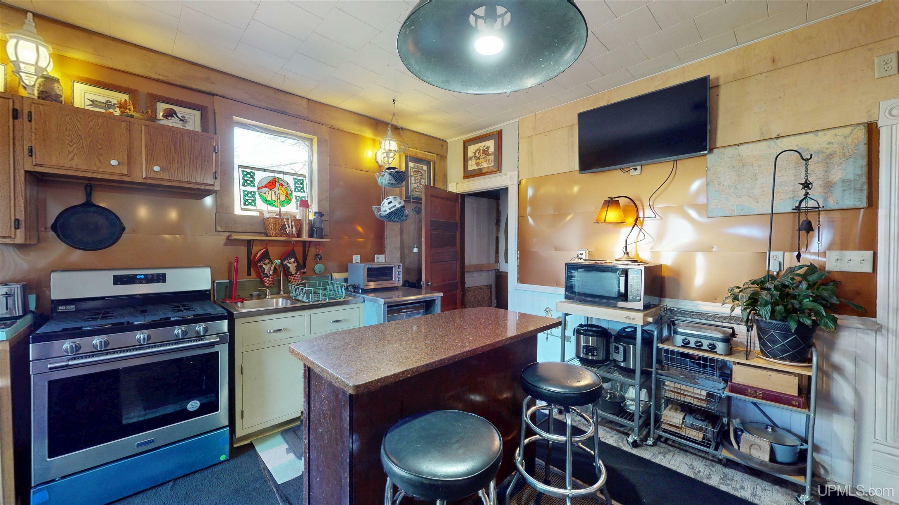 Property Photo:  417 Tamarack Street  MI 49913 