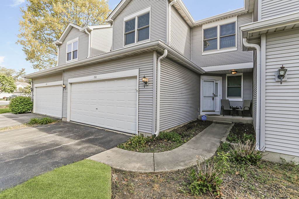 Property Photo: 111 Woodland Circle IL 60542