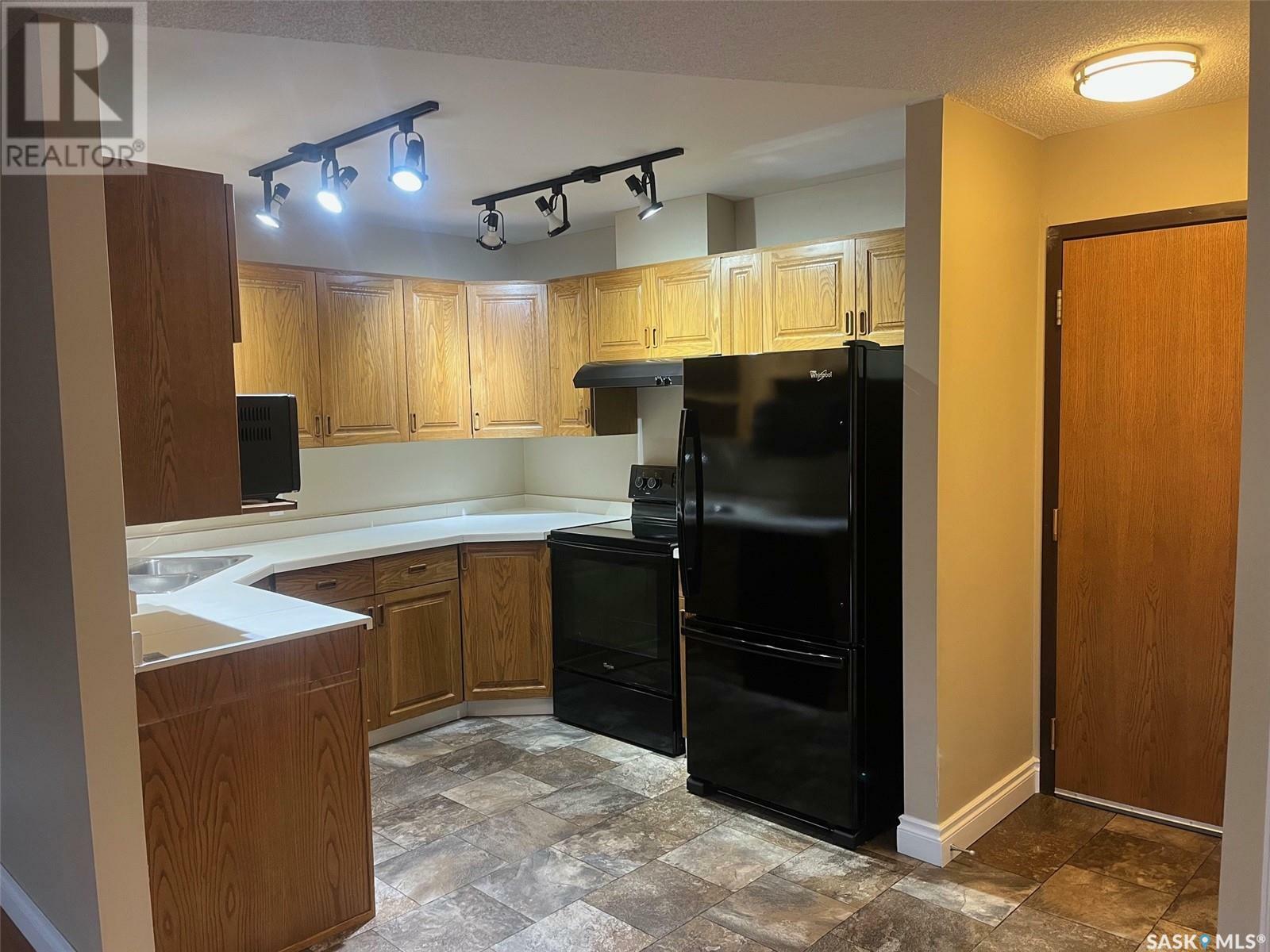 Property Photo: 304 408 Heritage Drive SK S4A 2P7