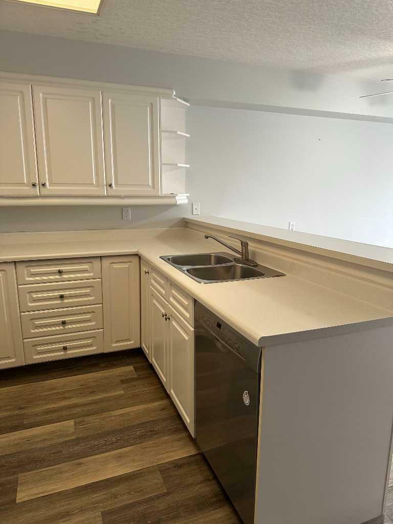Property Photo: 620 Columbia Boulevard W 214 AB T1K 7A8