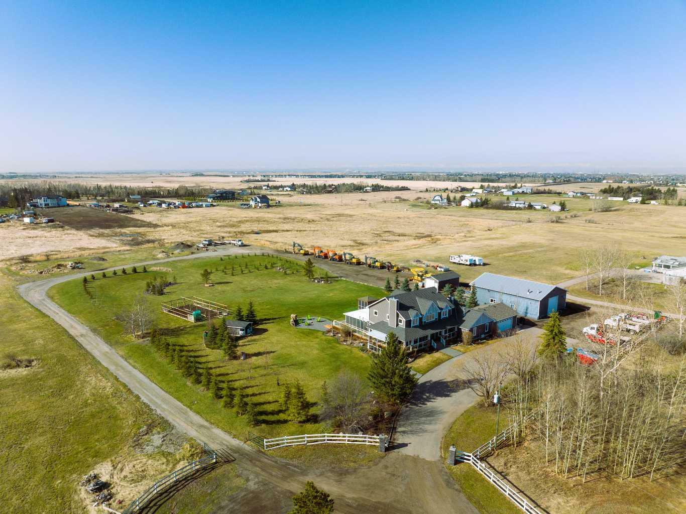 Property Photo: 280143 Twp Road 242 AB T1X 0M5