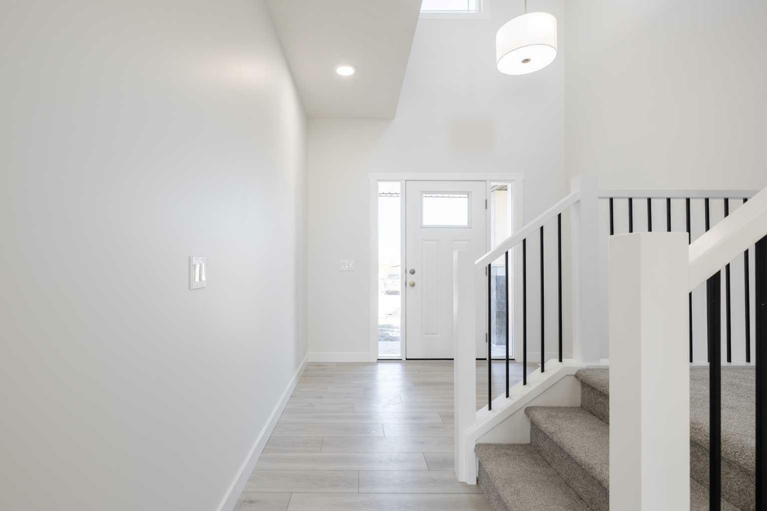 Property Photo: 145 Sunstone Way AB T4B 5T5