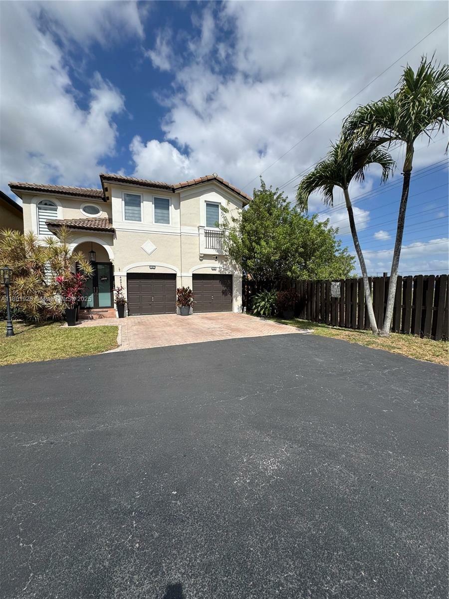 Property Photo: 4892 NW 109th Pl FL 33178