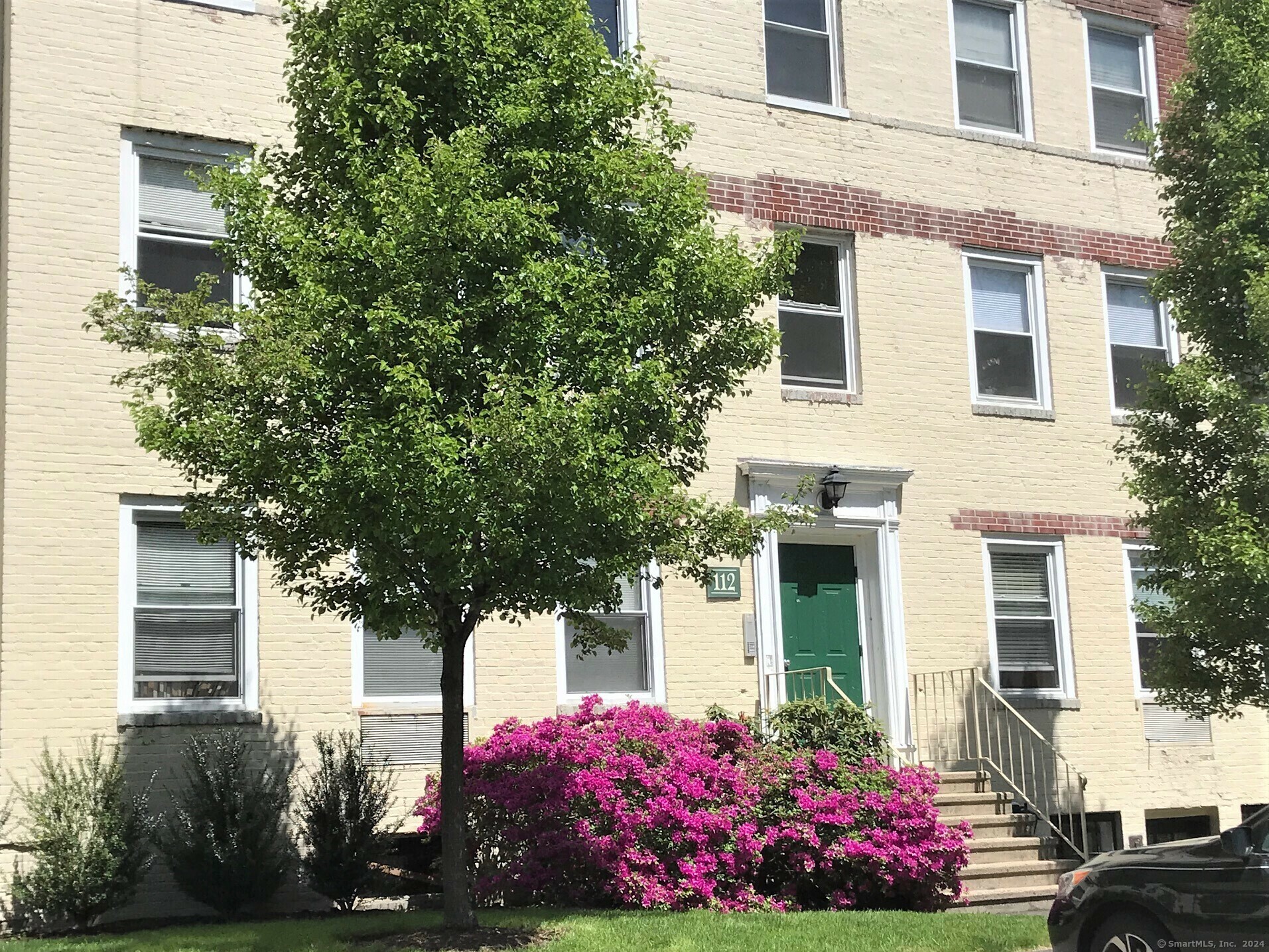 Property Photo: 112 Woodside Green 2A CT 06905