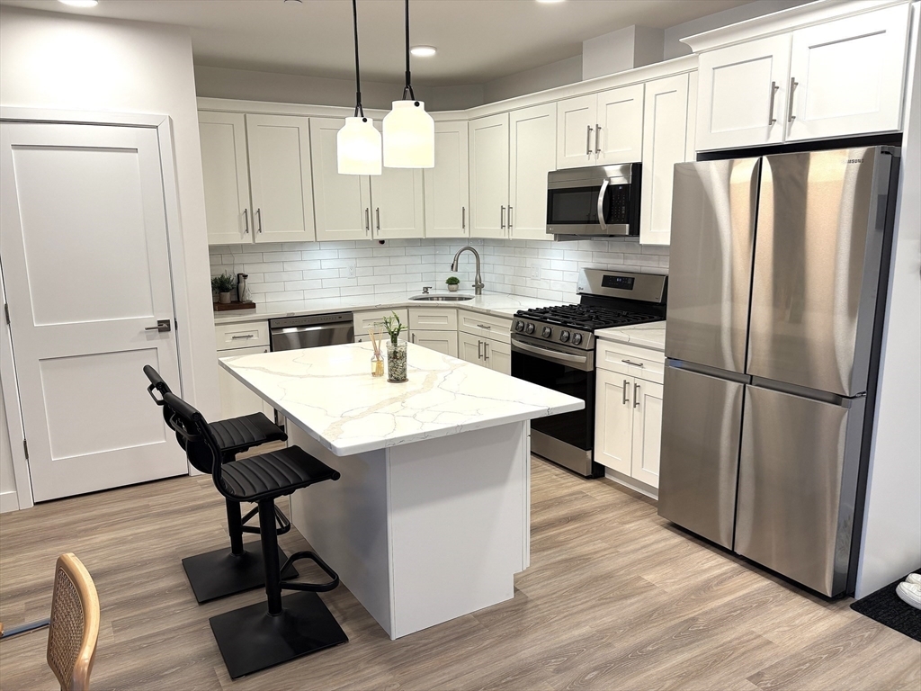 Property Photo:  1133 North Shore Rd 404  MA 02151 