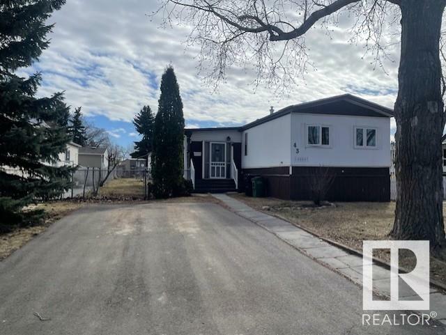 Property Photo: 43 Maple Ridge Drive NW AB T6P 1A9