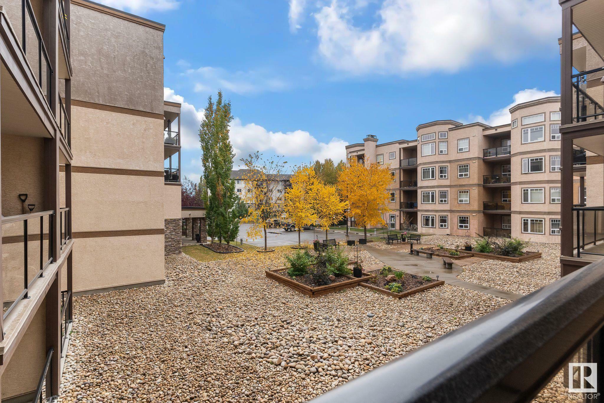 Property Photo: 2045 Grantham Court NW 405 AB T5T 3X4