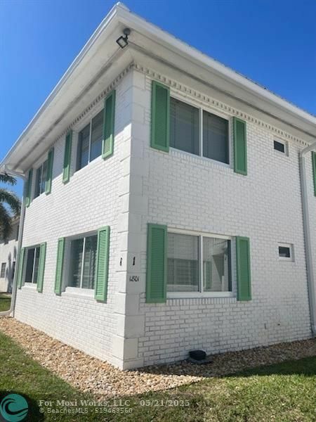 Property Photo:  1801 NE 62nd St 127  FL 33308 