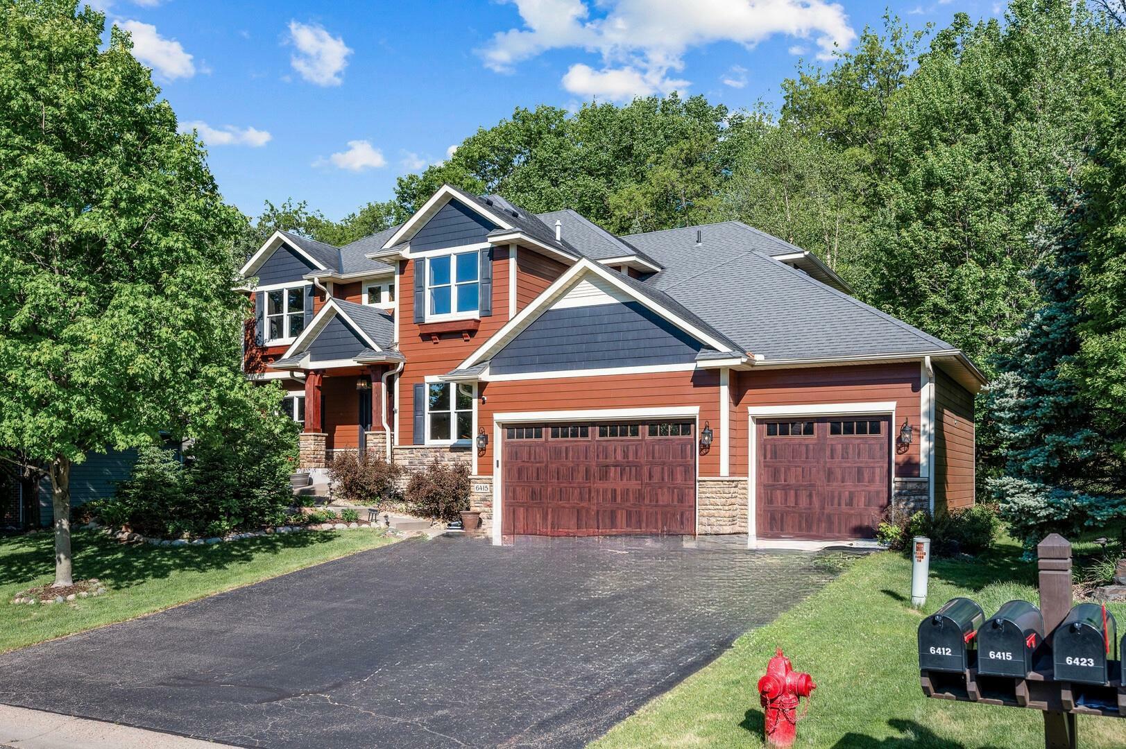 Property Photo: 6415 Queensland Lane N MN 55311