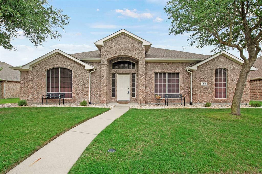 Property Photo:  1212 Live Oak Street  TX 75189 