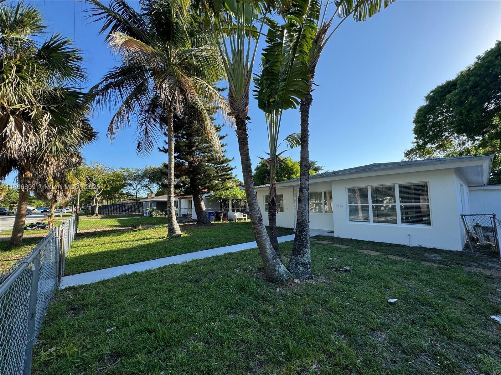 Property Photo: 1229 NW 7th Ave FL 33311