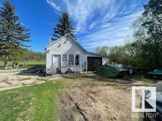 Property Photo: 555049 Range Road 170 AB T0V 0C0