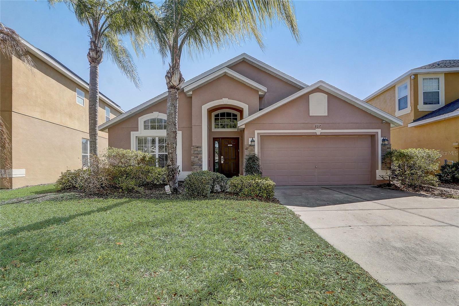 Property Photo: 927 Orange Cosmos Boulevard FL 33837