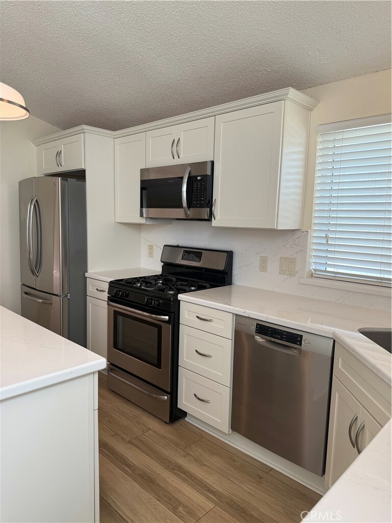 Property Photo:  140 W Pioneer Avenue 134  CA 92374 