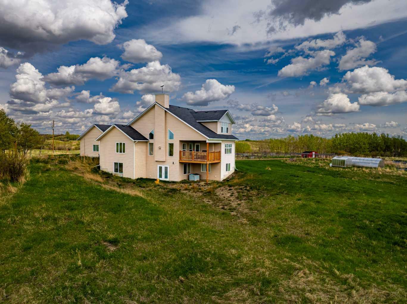 Property Photo: 274212 Lochend Road AB T4C 2Y2