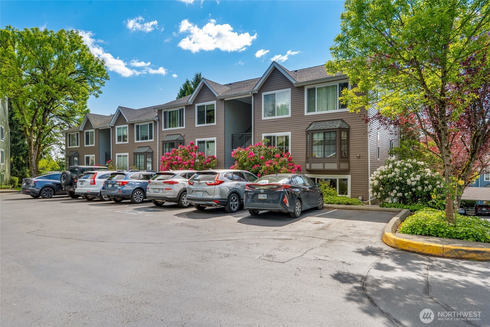 Property Photo:  12724 NE 144th Street E-104  WA 98034 