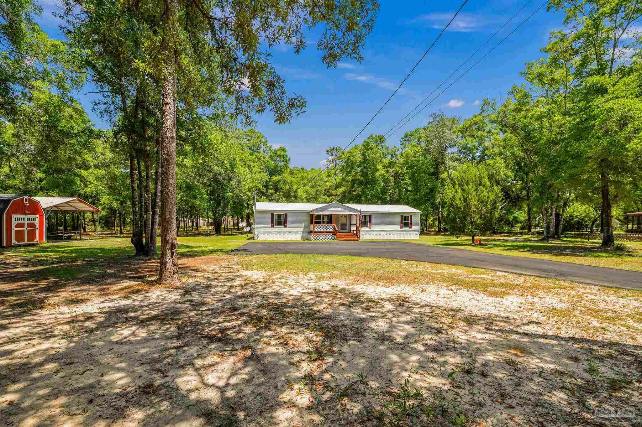Property Photo:  8944 John Hamm Rd  FL 32583 