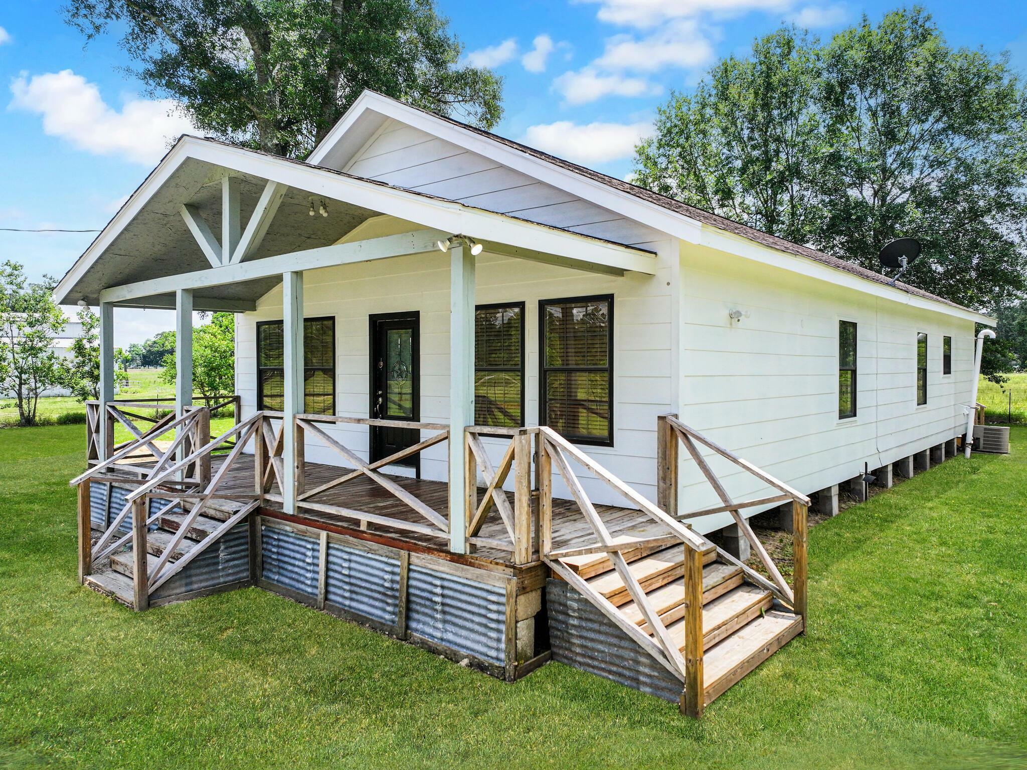Property Photo:  2432 Hwy 327  TX 77625-6901 