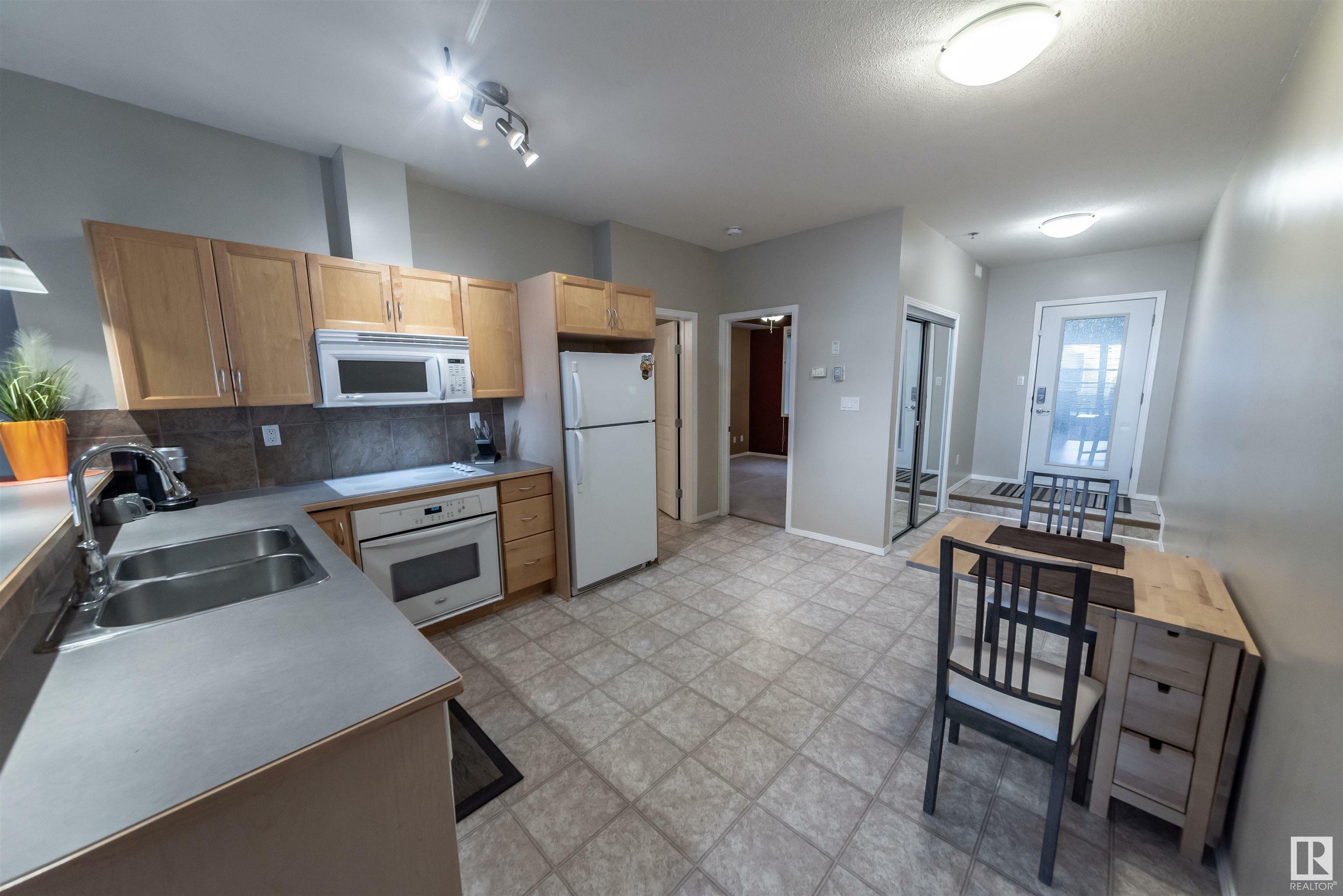 Property Photo: 4827 104A Street NW 150 AB T6H 0R5