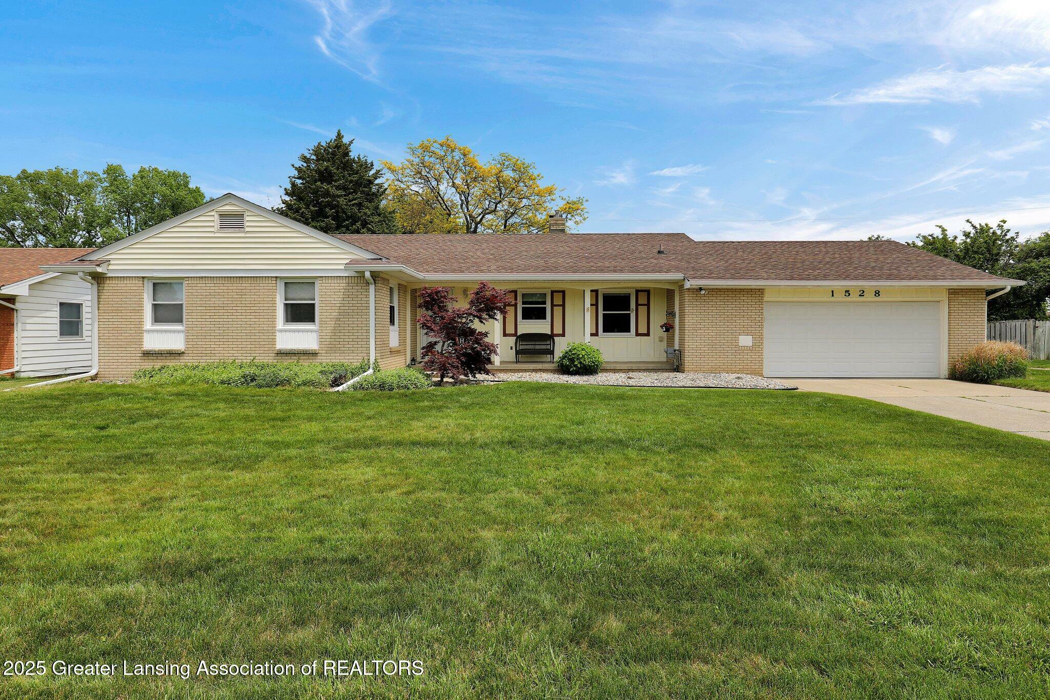 Property Photo: 1528 Briarwood Drive MI 48917