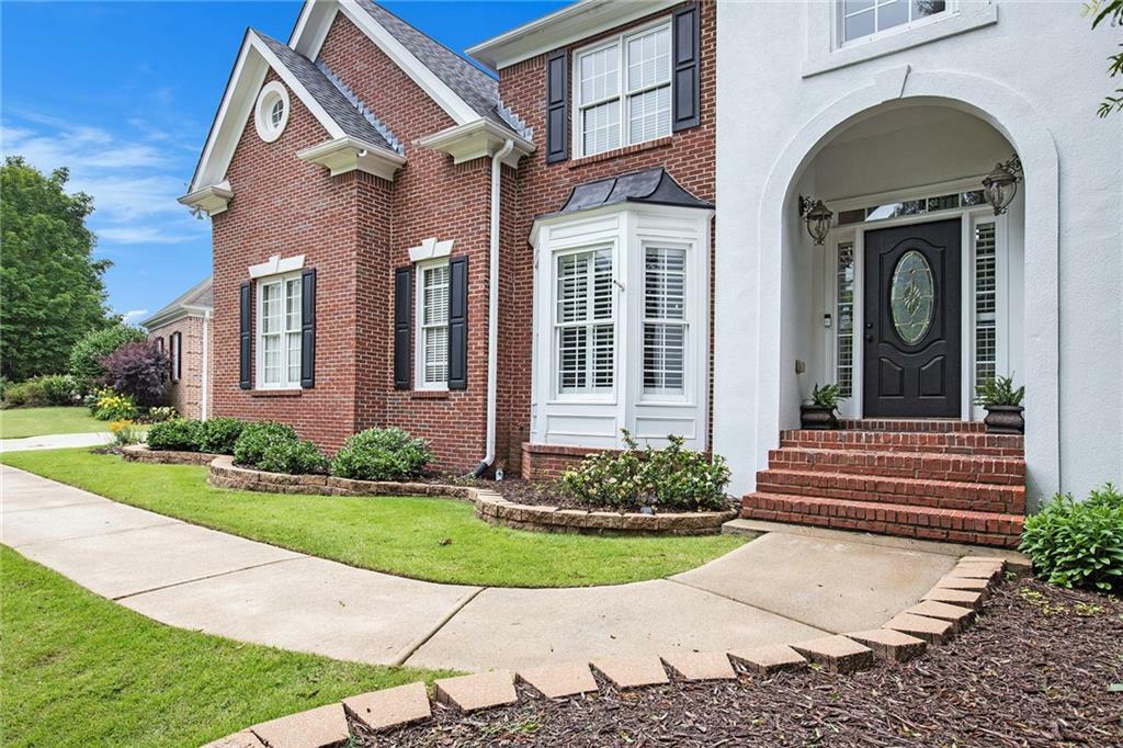 Property Photo: 650 Garden Wilde Place GA 30075
