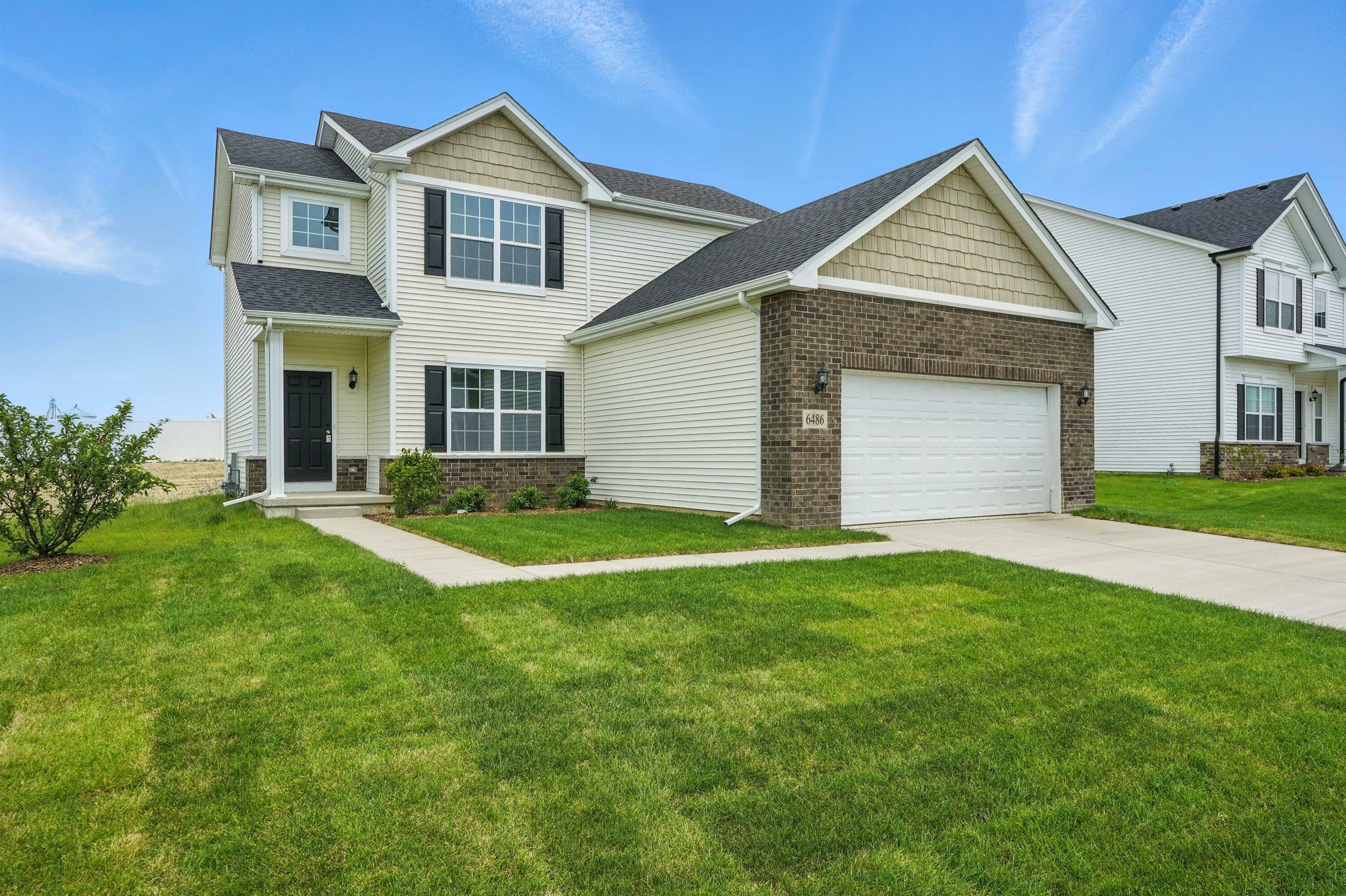 Property Photo: 6486 E 104th Avenue IN 46307