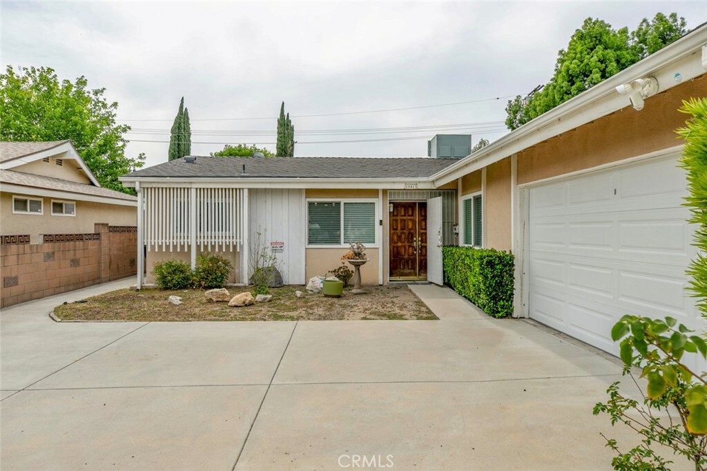 Property Photo:  10415 Wish Avenue  CA 91344 