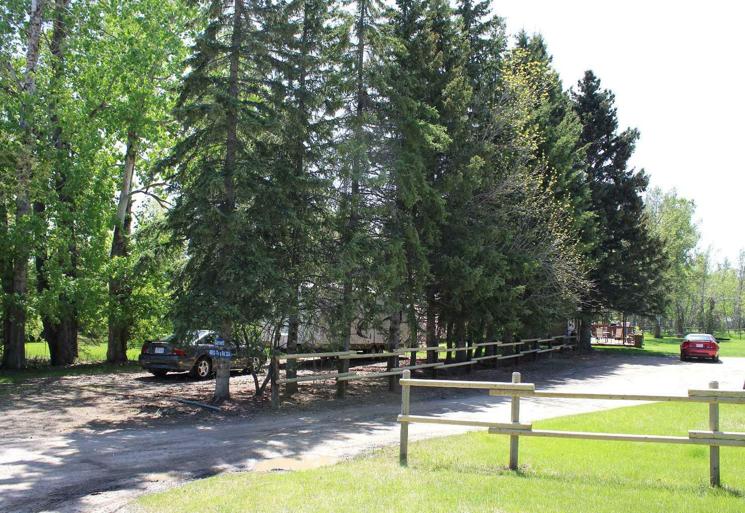 Property Photo: 4003 Township Road 324 AB T4H 4C3