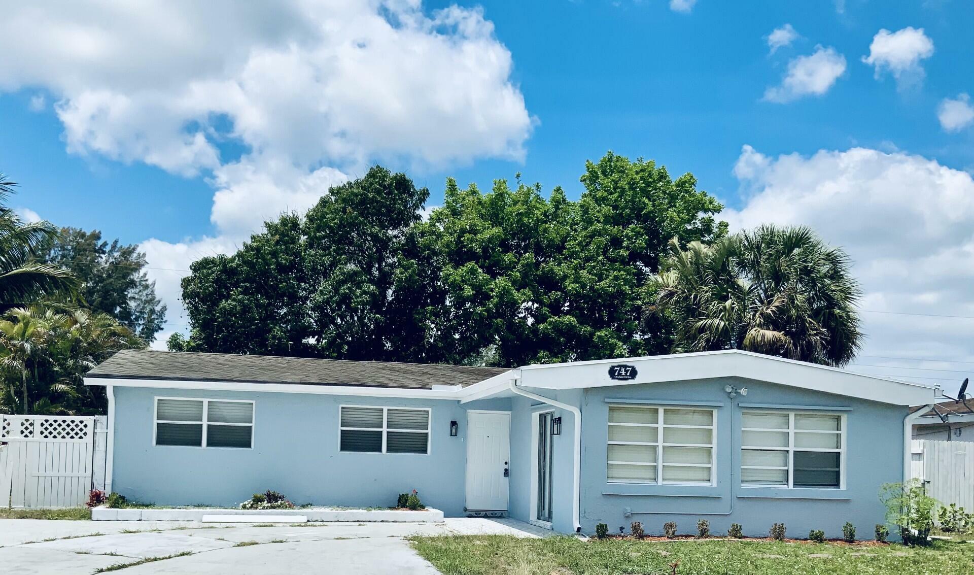 Property Photo: 747 Orchid Drive FL 33411