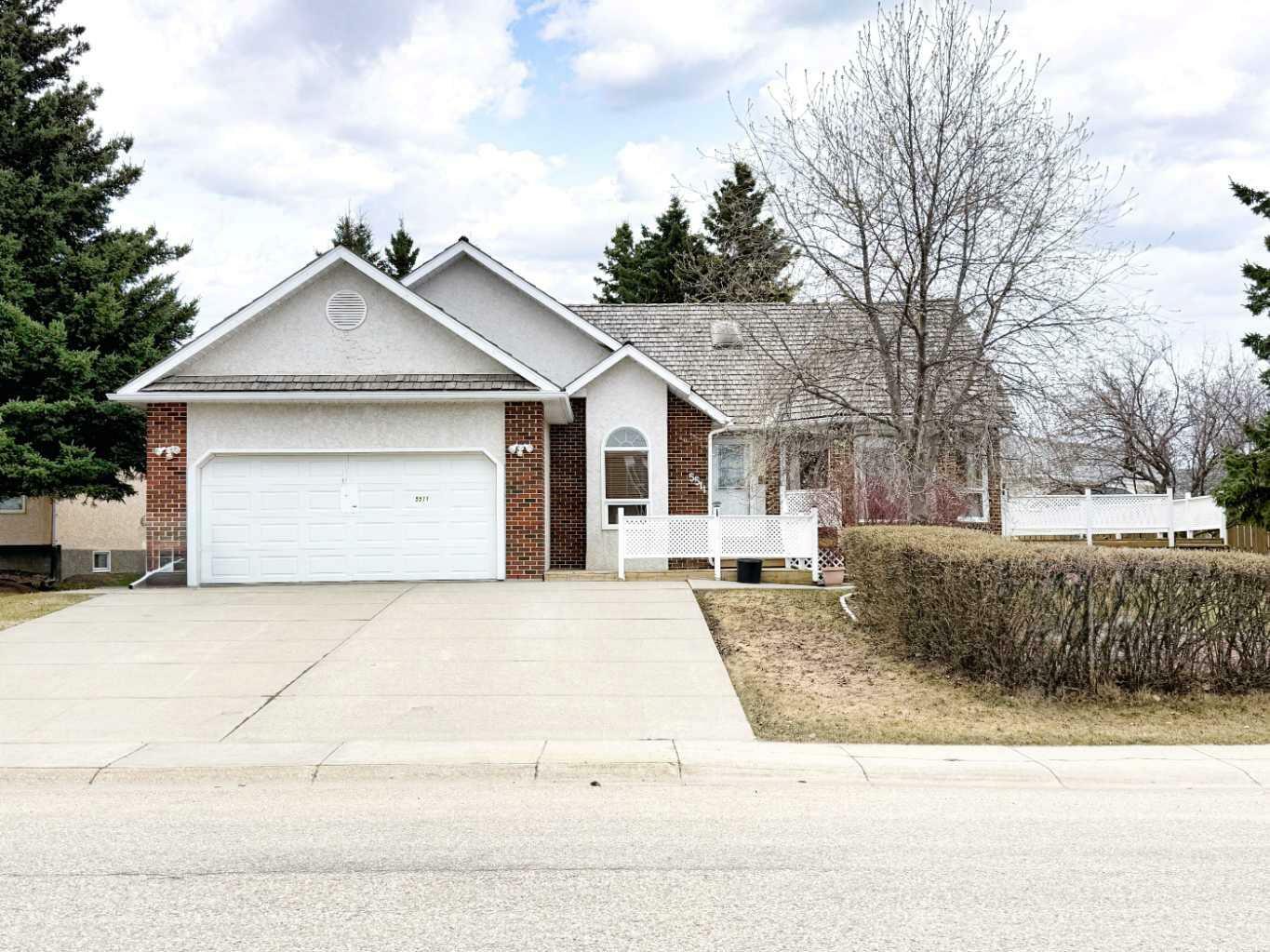 Property Photo: 5511 Shannon Drive AB T4H 1C2