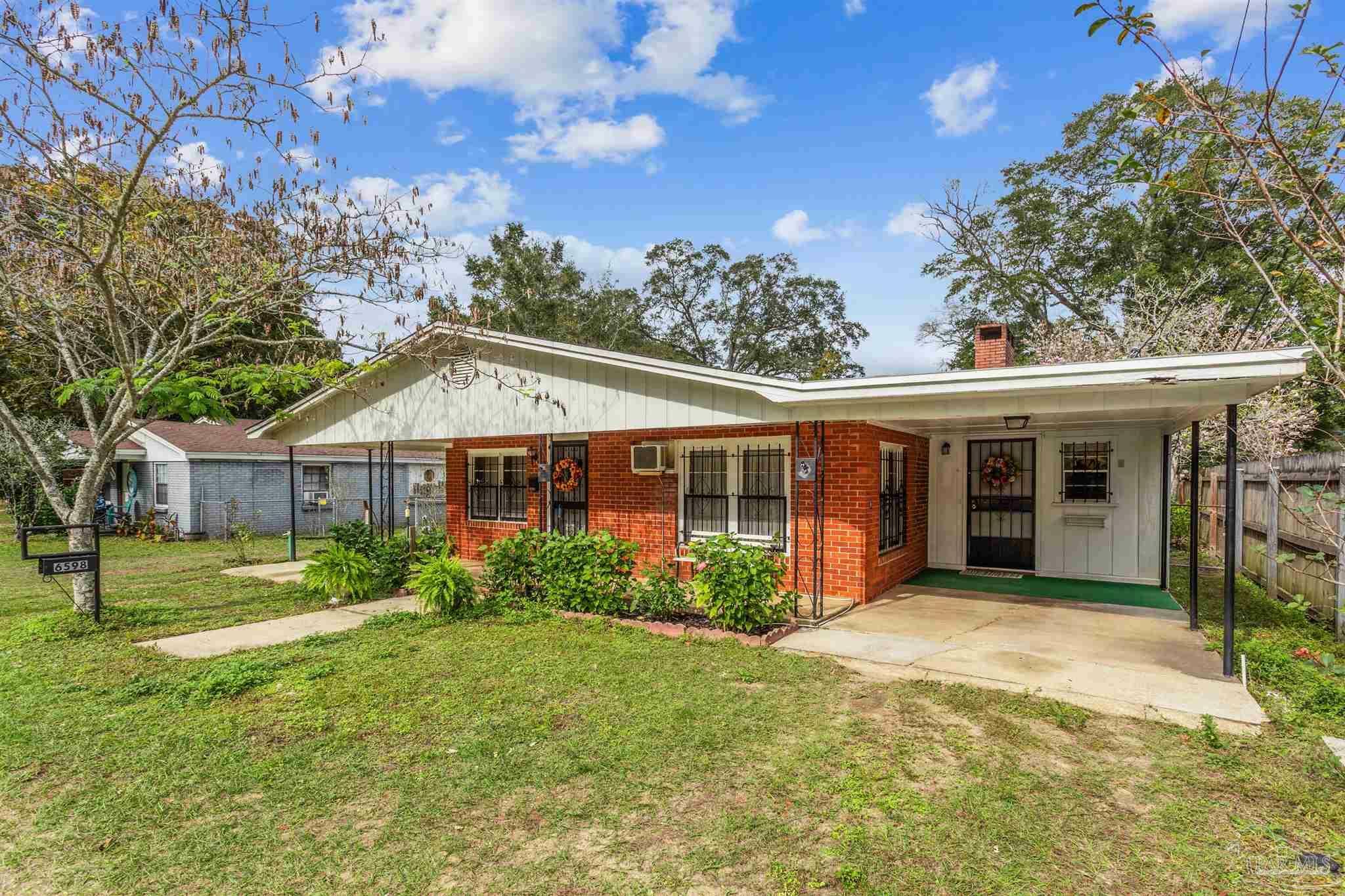 Property Photo: 6598 Magnolia St FL 32570