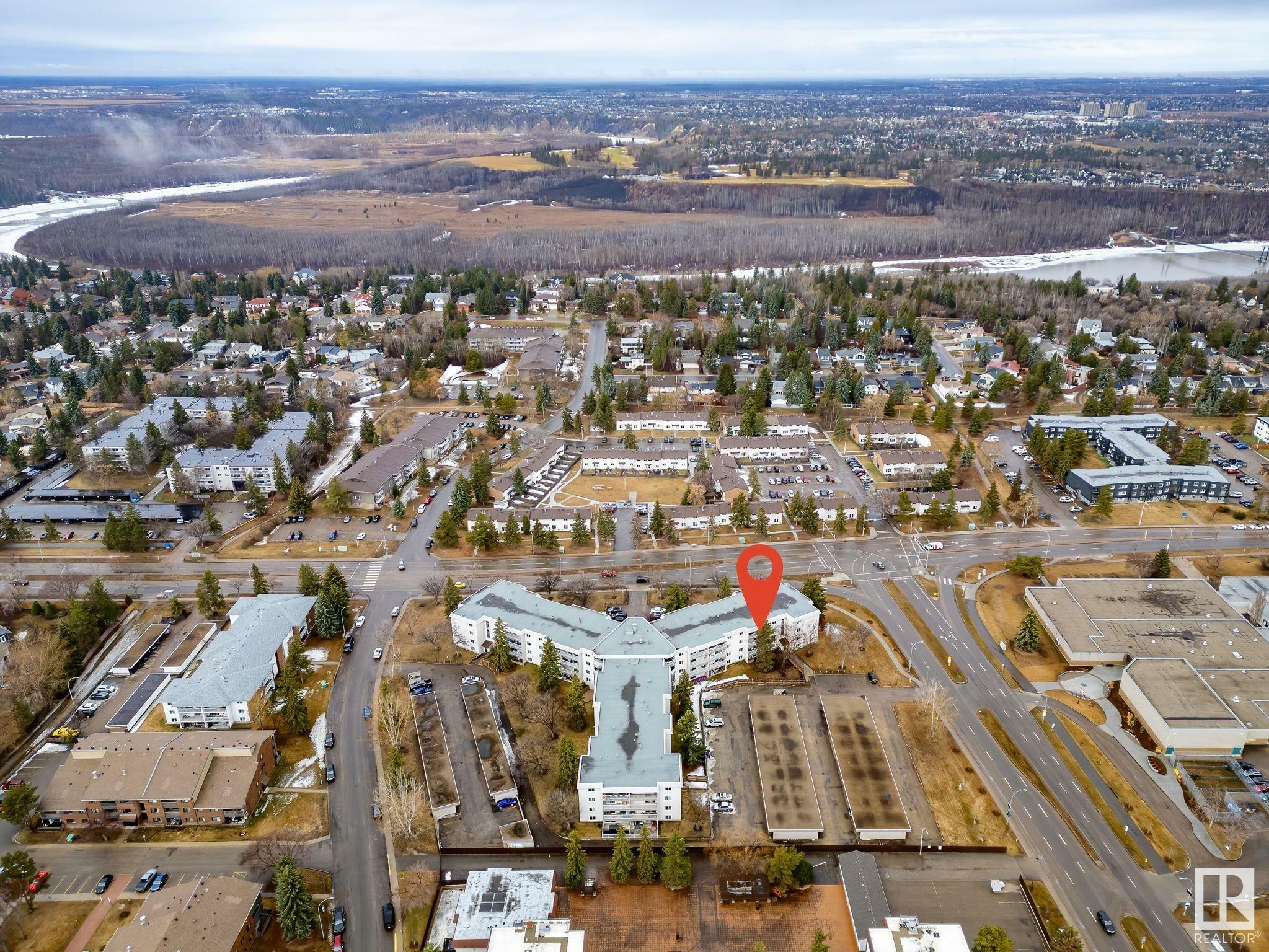 Property Photo: 5125 Riverbend Road NW 106 AB T6H 5K5