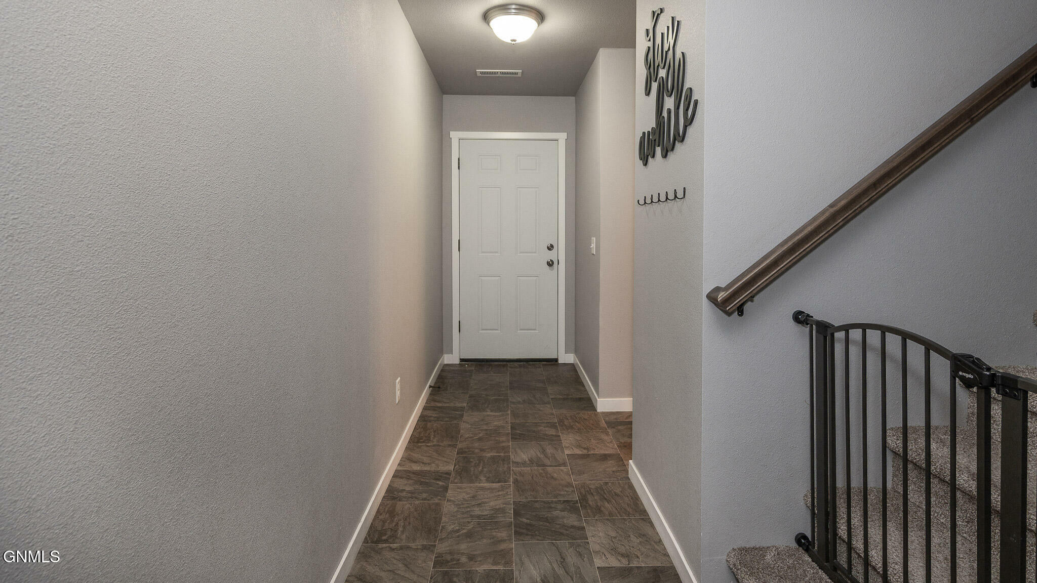 Property Photo: 4523 Corvette Street NW ND 58554