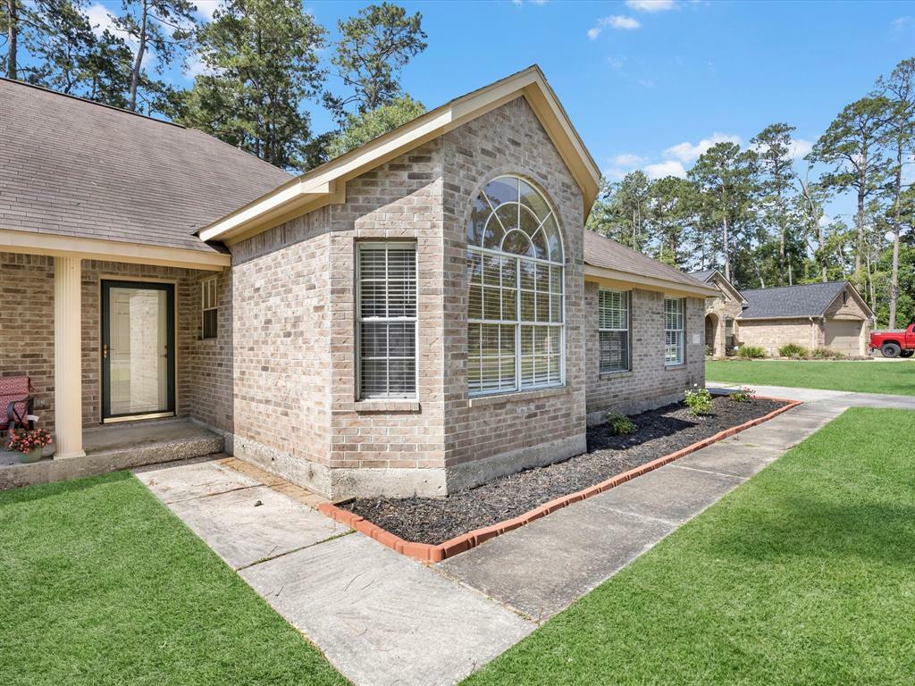 Property Photo: 2623 S Colosseum Court TX 77357