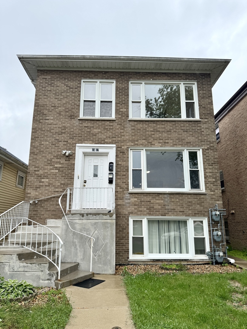 Property Photo: 2327 N 75th Avenue 1 IL 60707