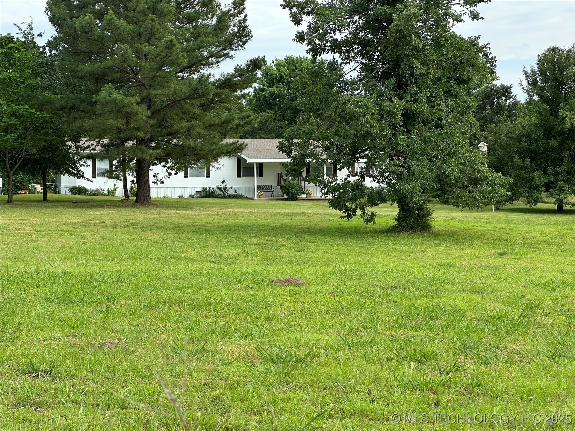 Property Photo: 5831 E 93rd Street S OK 74403