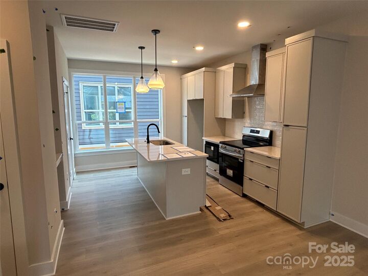Property Photo: 419 Devender Lane NE 3 NC 28217