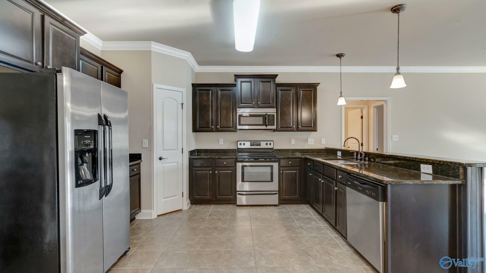 Property Photo: 7913 Gabriela Drive NW AL 35806