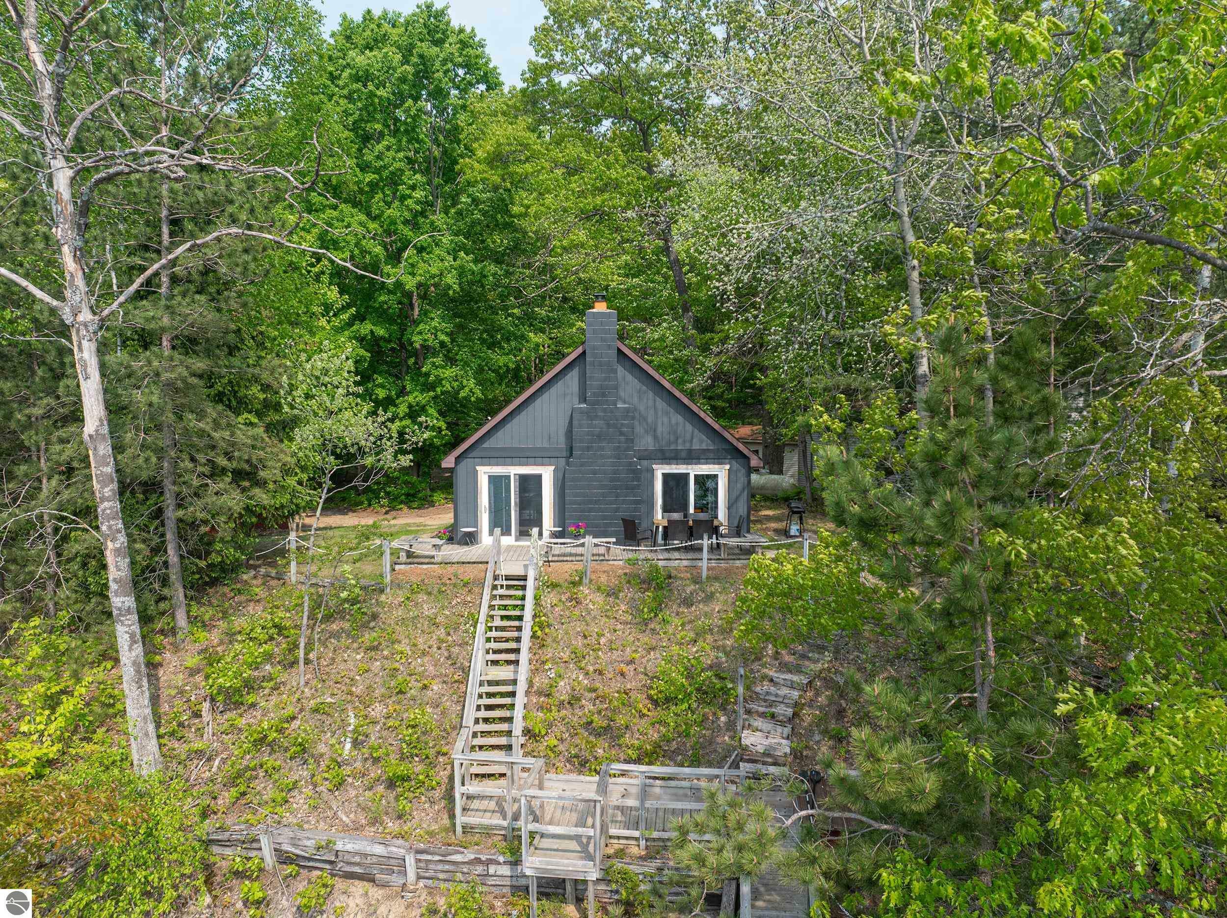 Property Photo:  10974 NE Bluff Drive  MI 49659 