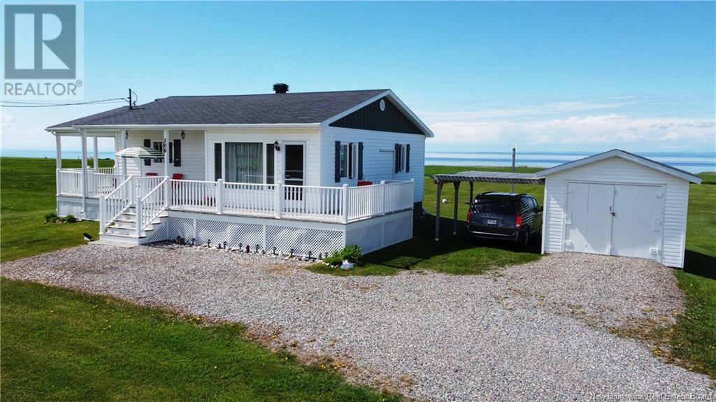 Property Photo:  506 Rue Acadie  NB E8N 1E4 