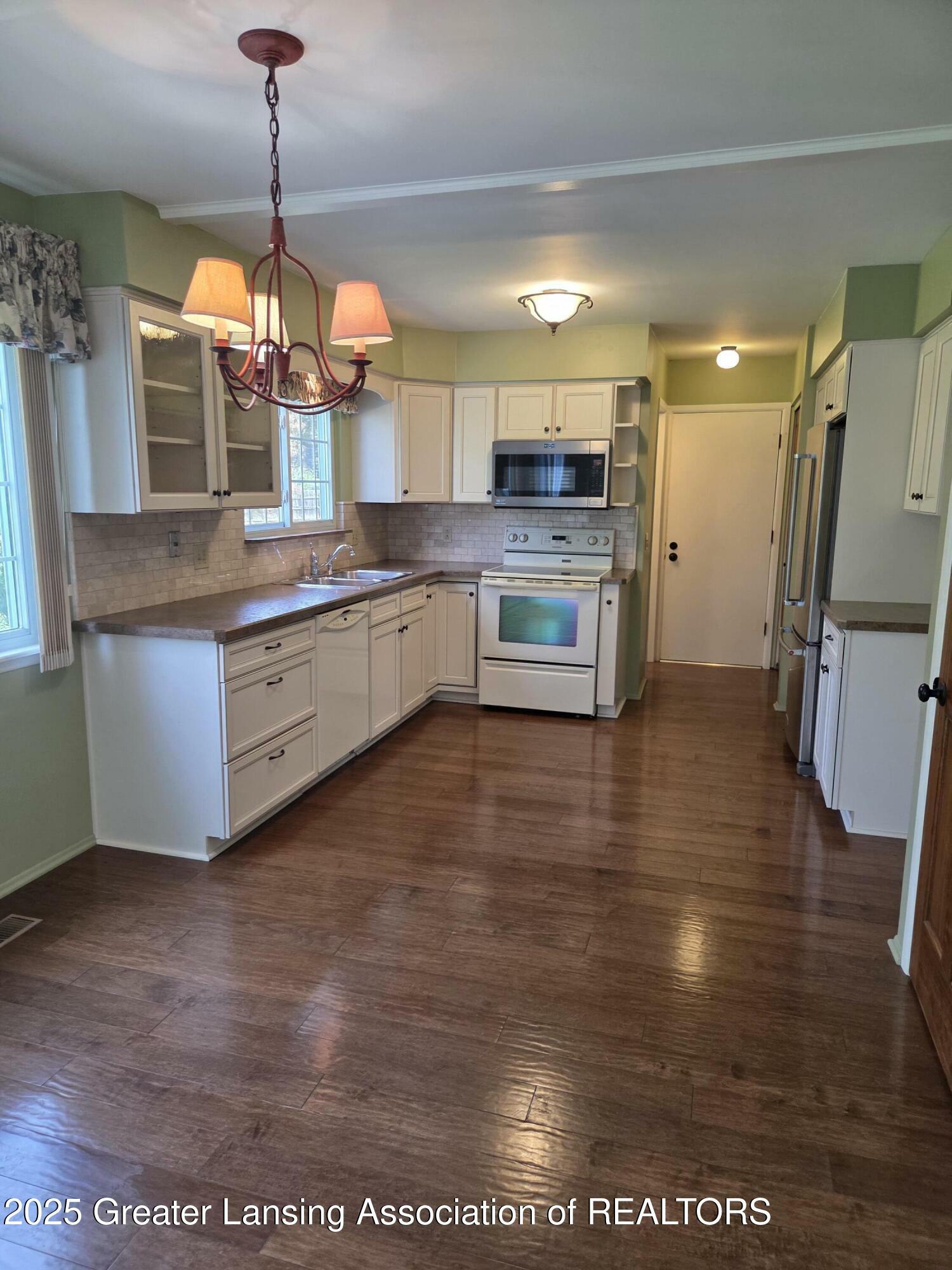 Property Photo: 2115 Lyman Drive MI 48912